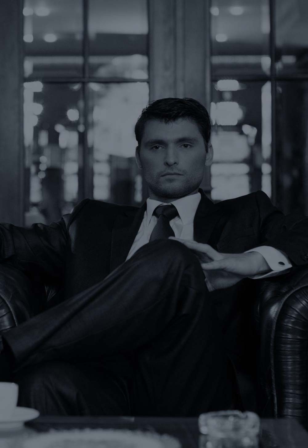 man sitting in suit